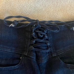 Corset detail dark wash skinny jeans